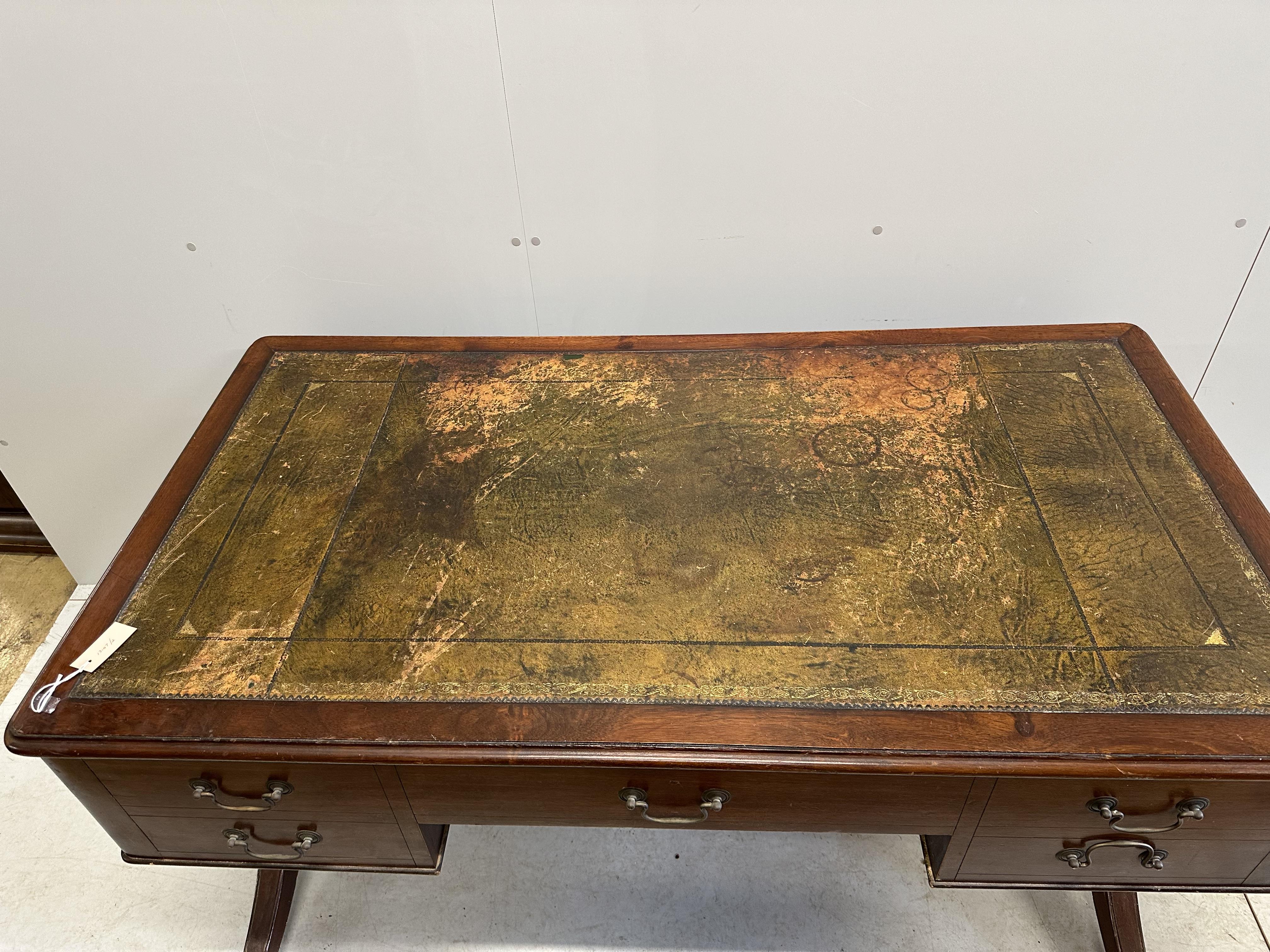 A Victorian mahogany kneehole writing table, width 148cm, depth 80cm, height 77cm